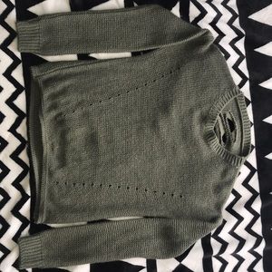 Green Sweater With Ladder Cut Outs In The Back